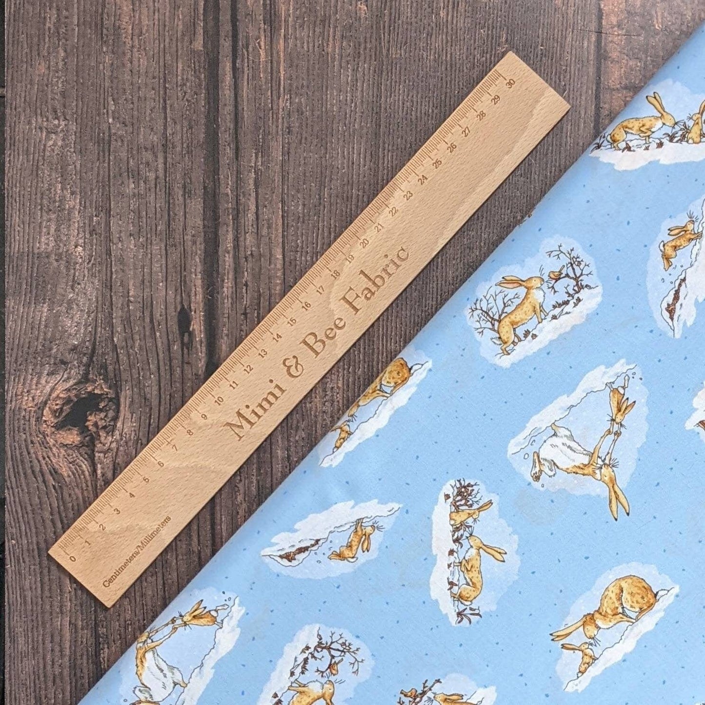Fabric Blue nursery animal hare cotton fabric 'Guess How much I love you' - Clothworks