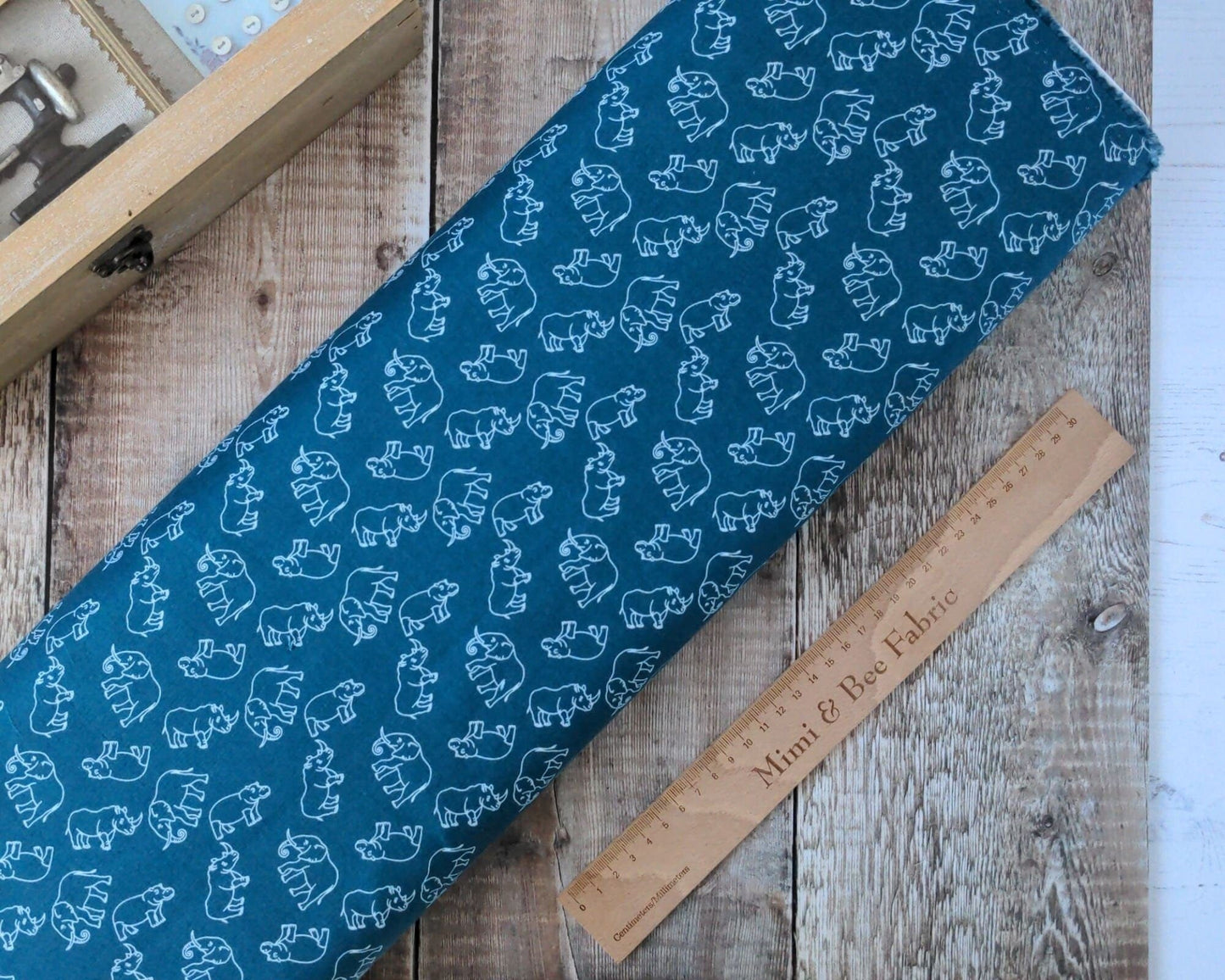 Fabric Elephants, rhinos and hippos on petrol blue cotton fabric