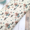 Jersey fabric Adventure Bear on beige cotton Jersey - 220gsm