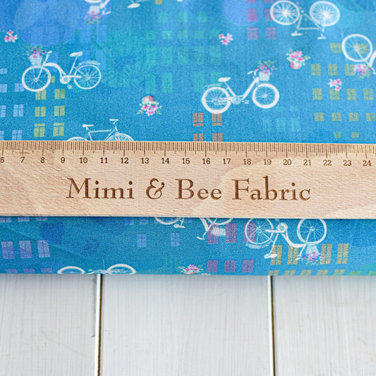 Fabric Bicycles on blue cotton fabric - Robert Kaufman