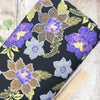 Fabric Black and purple floral double faced punta viscose jersey print