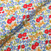 Fabric Cotton lawn dressmaking fabric with red and blue flowers - Peter Horton