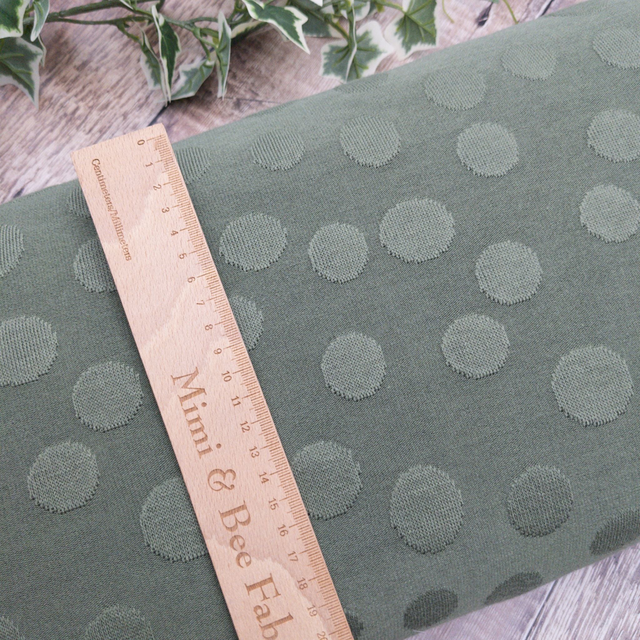 Green fabian dot stretch knit jersey fabric