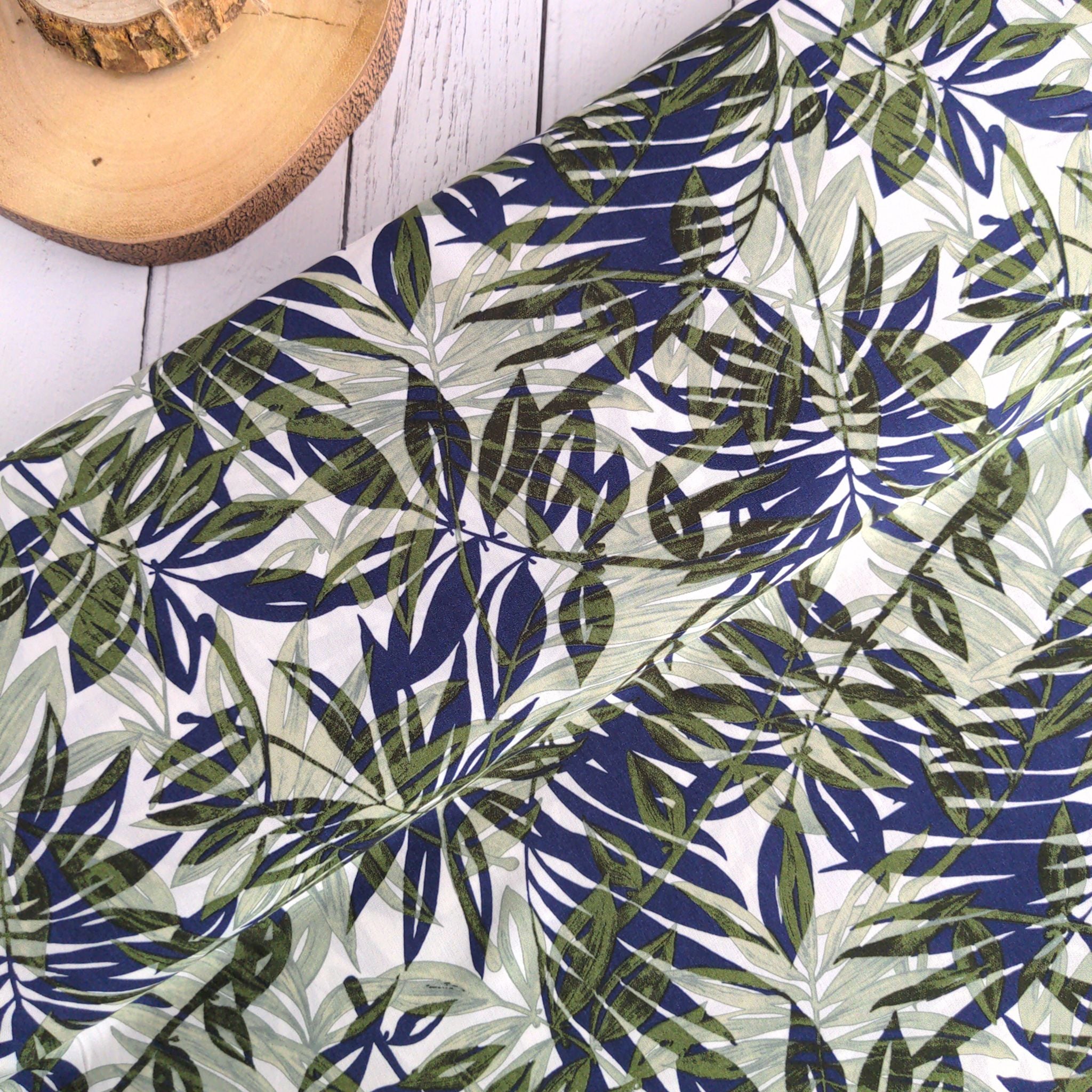 Green gingko palm leaves viscose dressmaking fabric