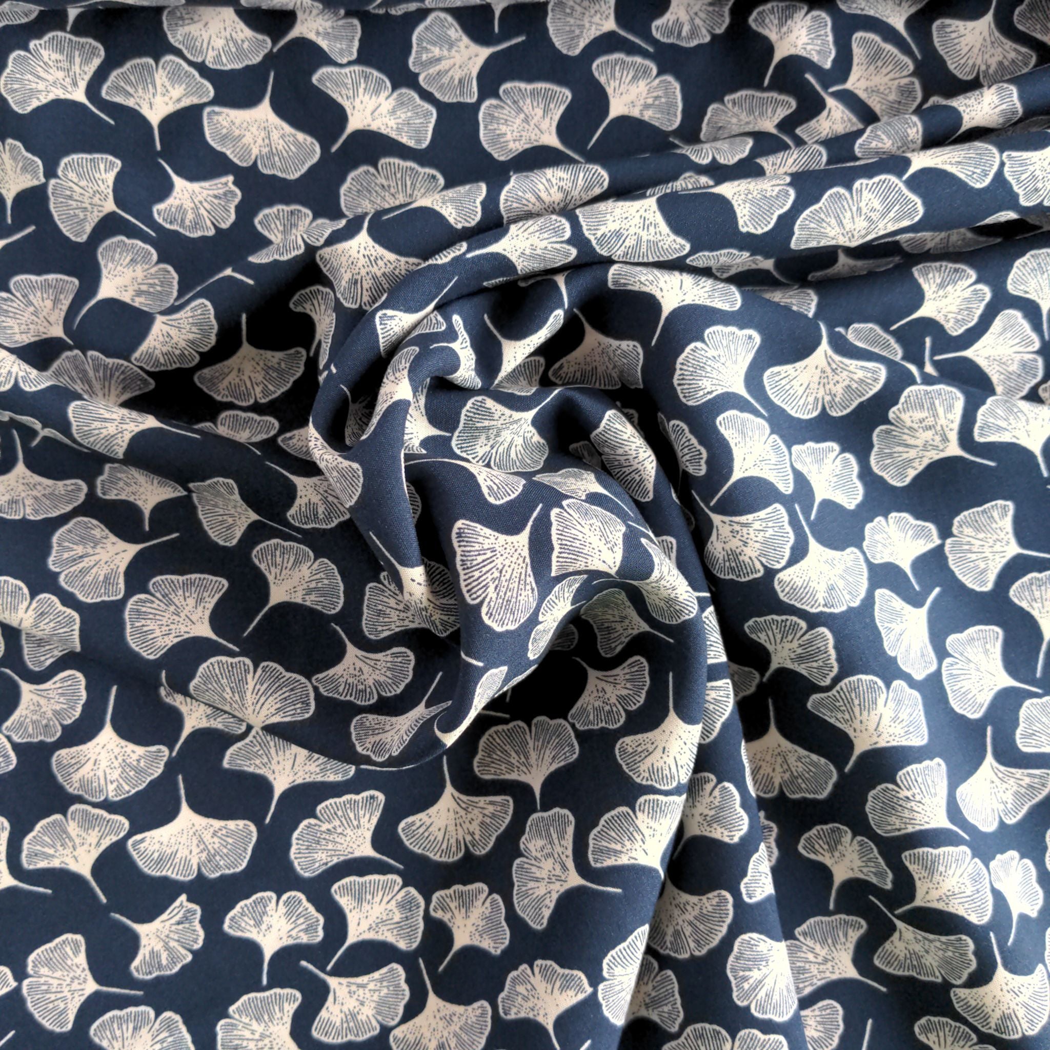 White petals on navy aanand viscose fabric