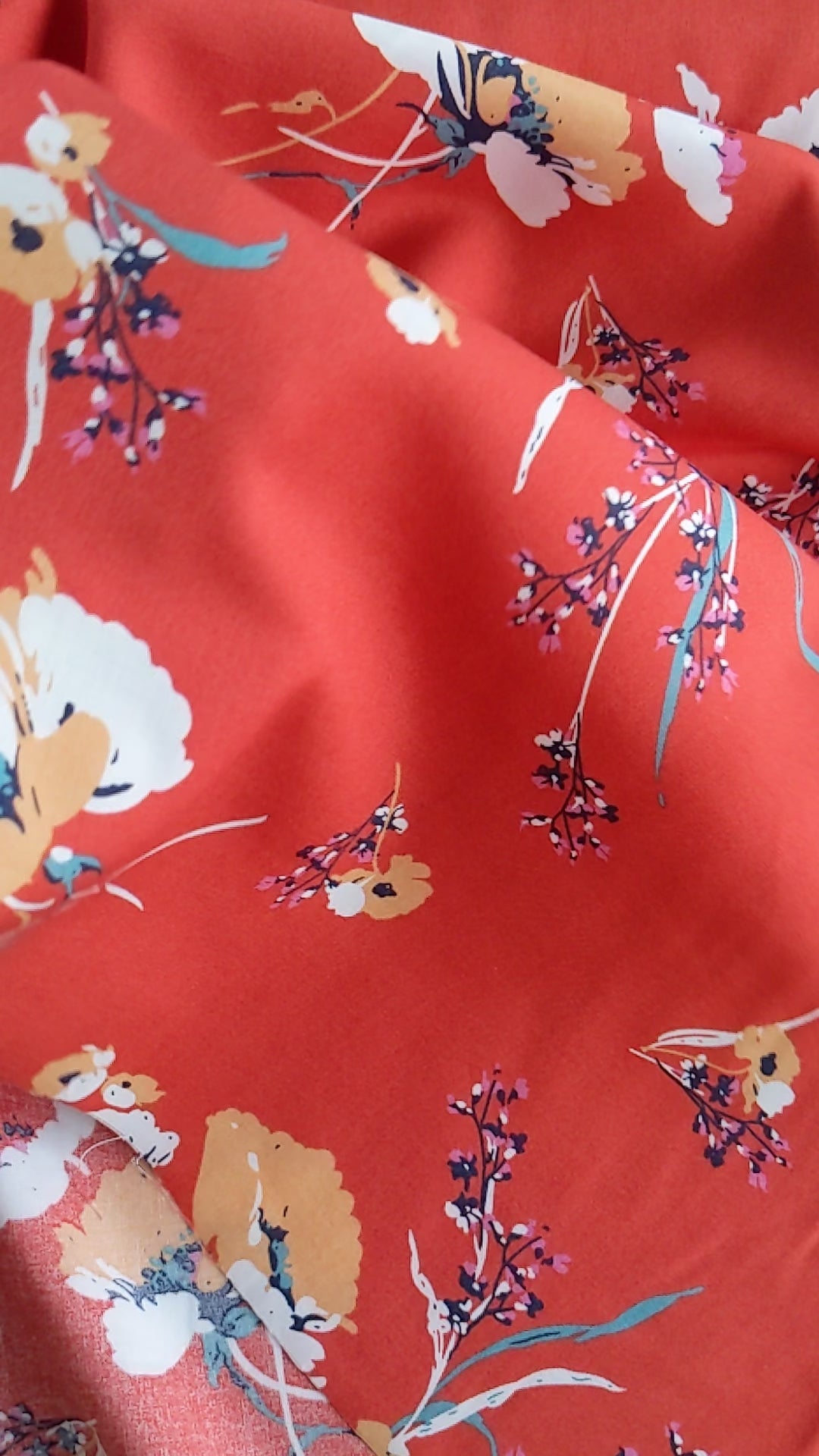 Terracota floral viscose dressmaking fabric