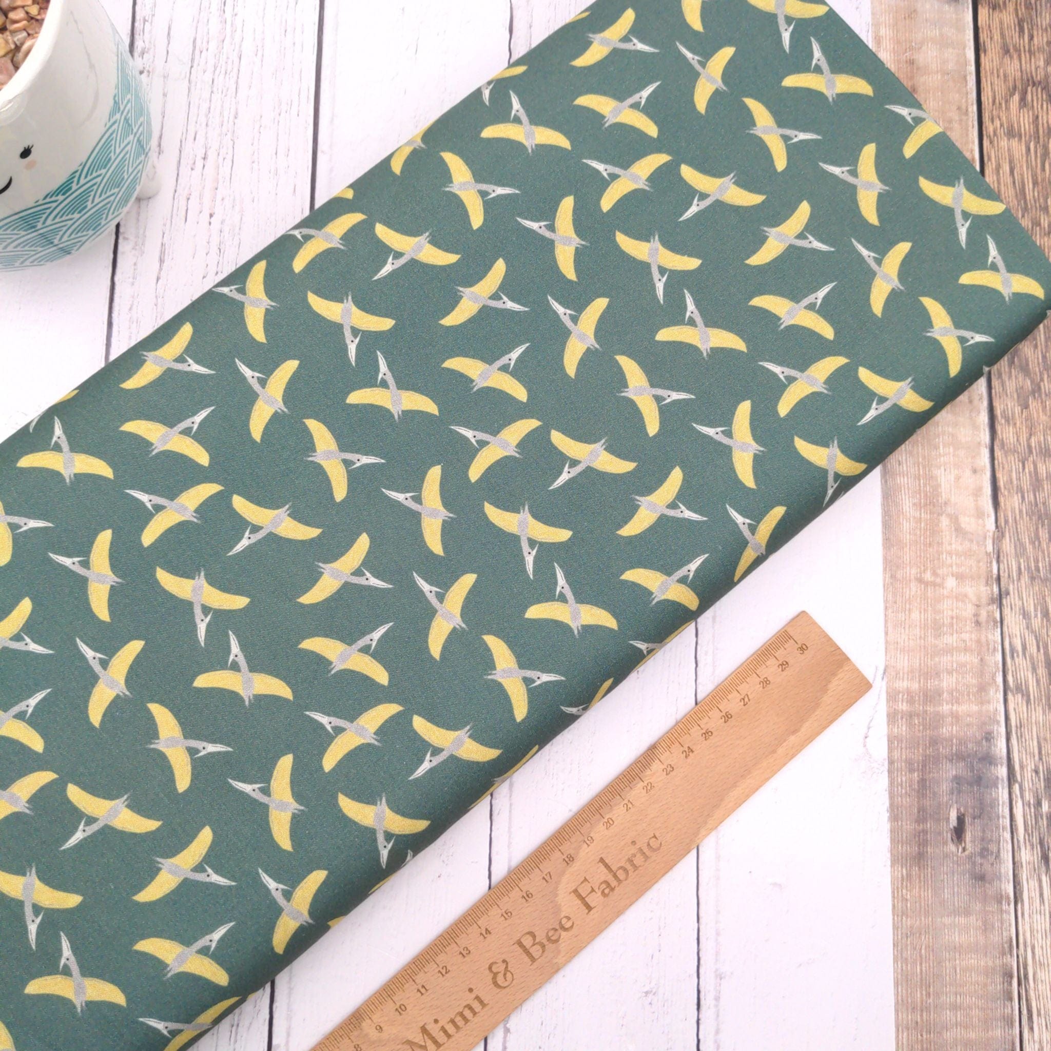 Fabric Pterosaur on olive cotton  - D is for Dinosaur - Dear Stella - DLT2347