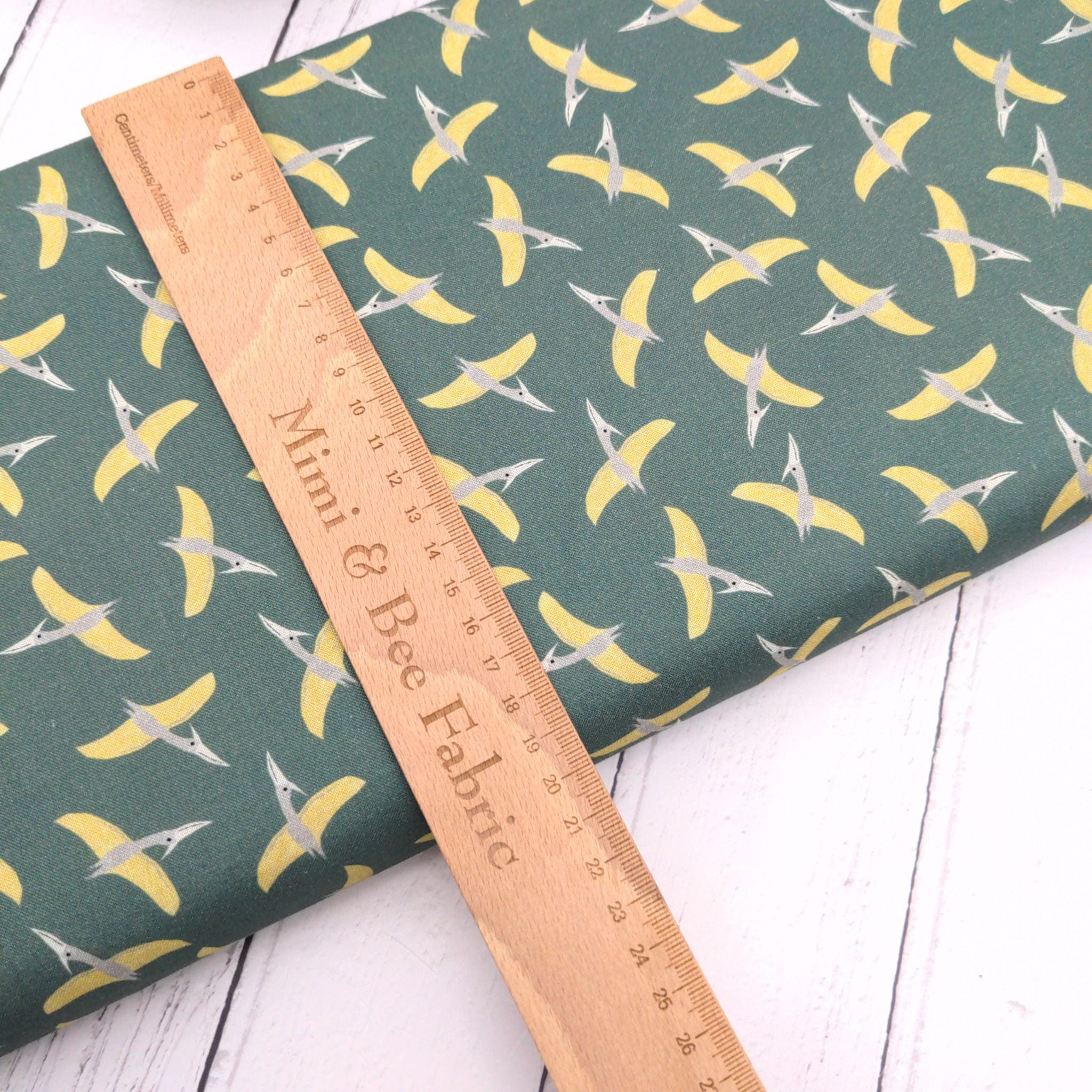 Fabric Pterosaur on olive cotton  - D is for Dinosaur - Dear Stella - DLT2347