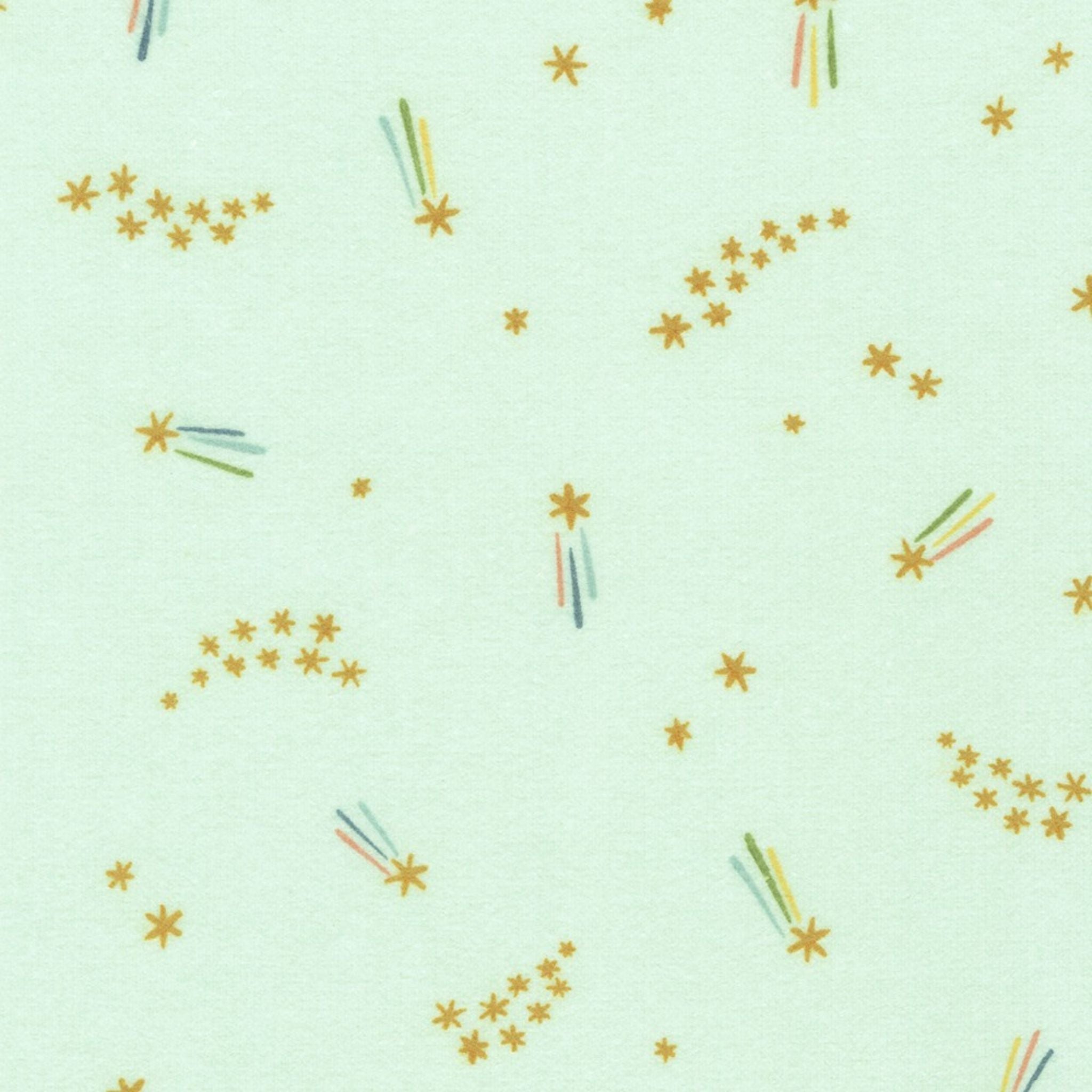 rainbow coloured shooting stars on mint green brushed cotton fabric - Over the Rainbow Cozy Cotton by Robert Kaufman