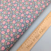 Rose pink flowers on grey cotton fabric - Market Garden - Henry Glass