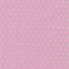White geometric pattern on light pink cotton fabric