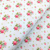 Vintage style pink roses on a pale blue polka dot fabric - Tea for Two - Northcott