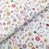 Wild flowers on green cotton fabric - Market Garden - Henry Glass