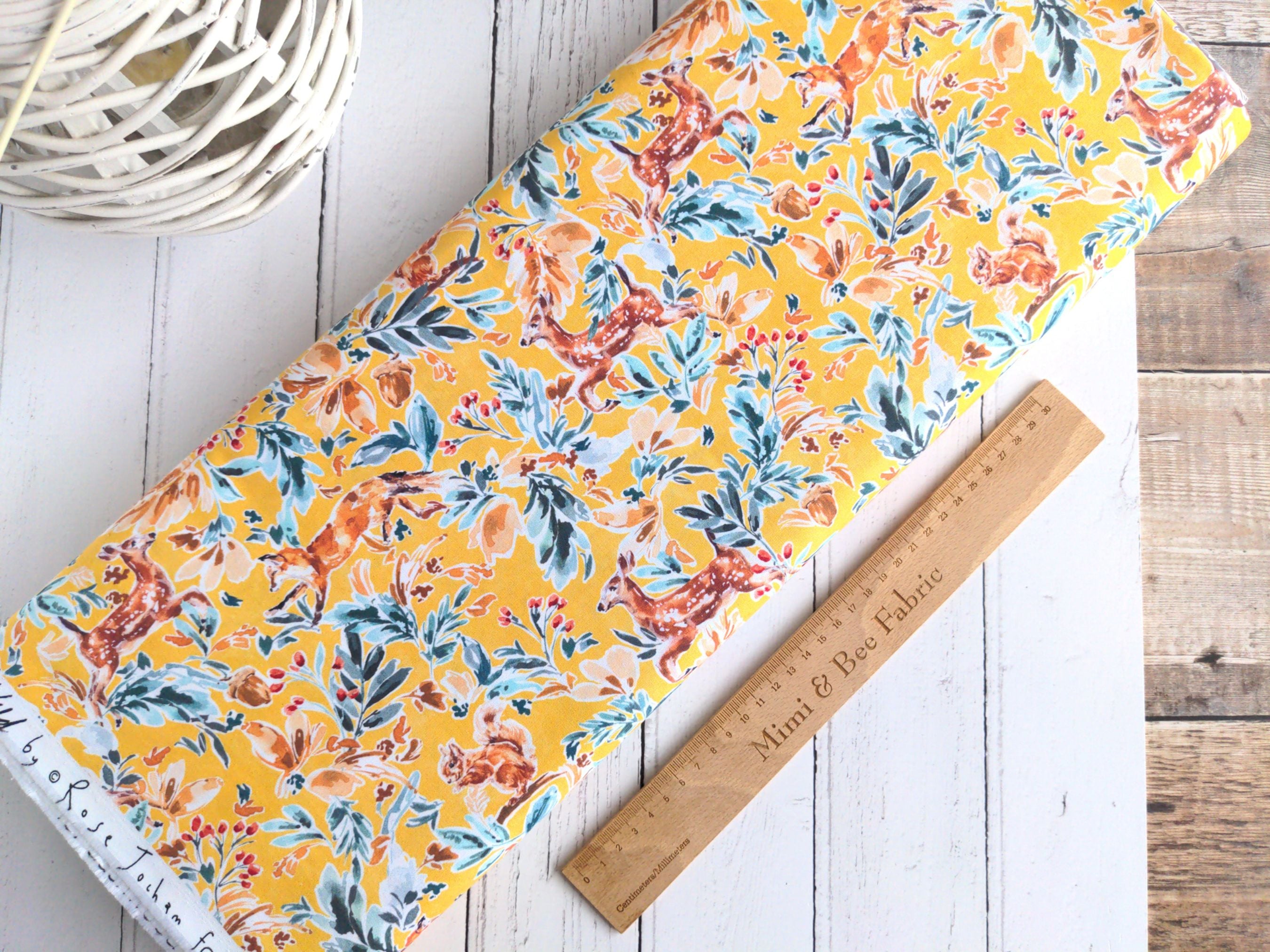 Forest animals and foliage on yellow cotton fabric - Into the wild by Dashwood Studio