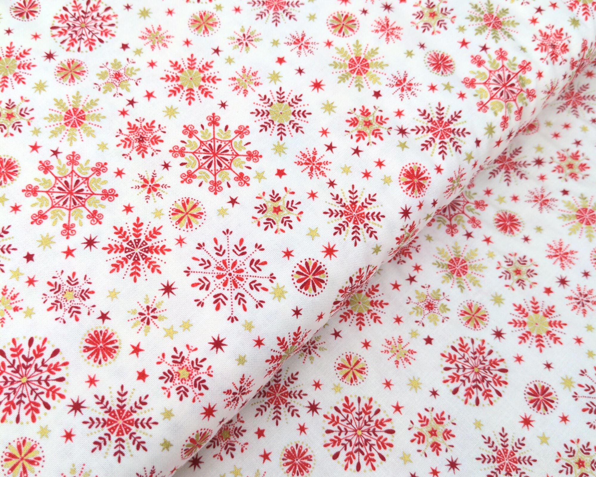 Snowflakes on red cotton fabric - Makower