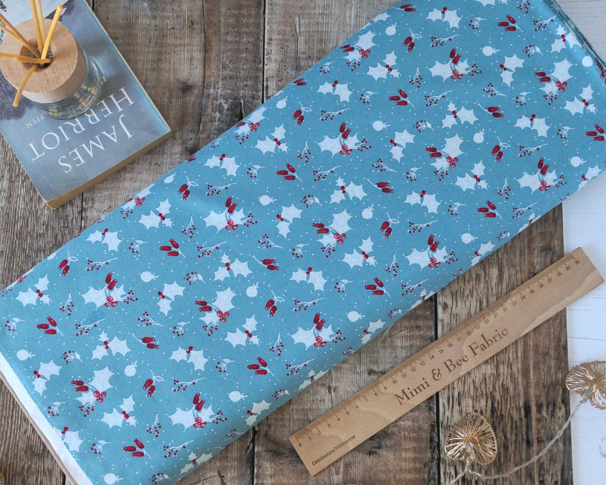Fabric Blue holly and berry cotton fabric, 100% cotton CraftCottonCo