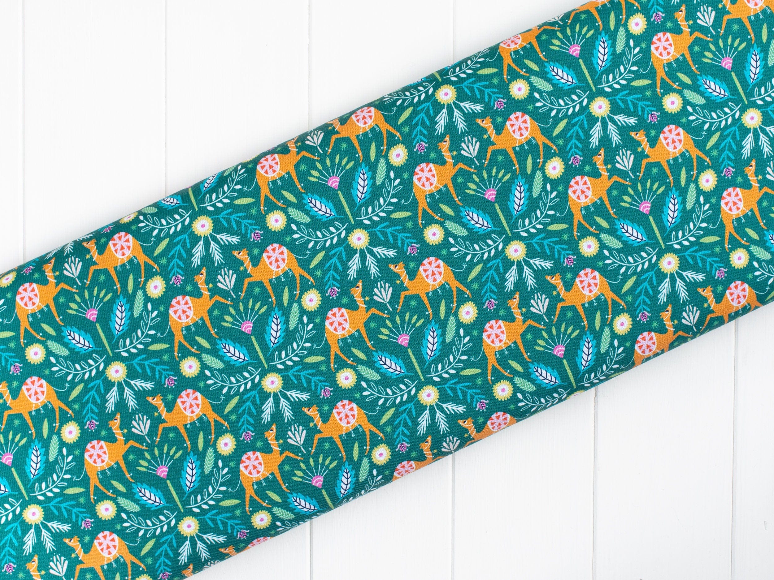 Fabric Camels and floral on green 100% cotton quilting fabric - 'Silk Roads' by Dashwood Studio