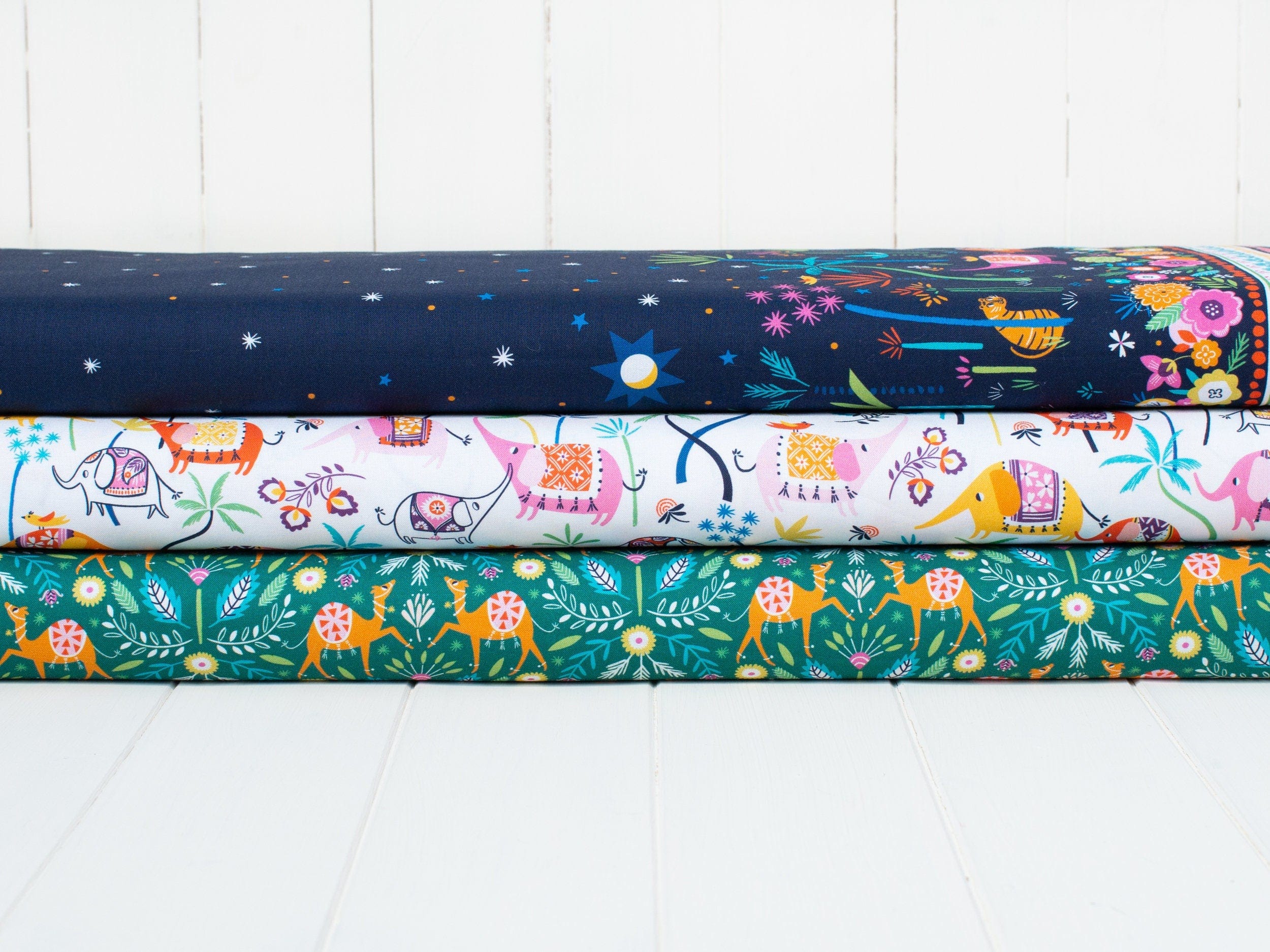 Fabric Camels and floral on green 100% cotton quilting fabric - 'Silk Roads' by Dashwood Studio