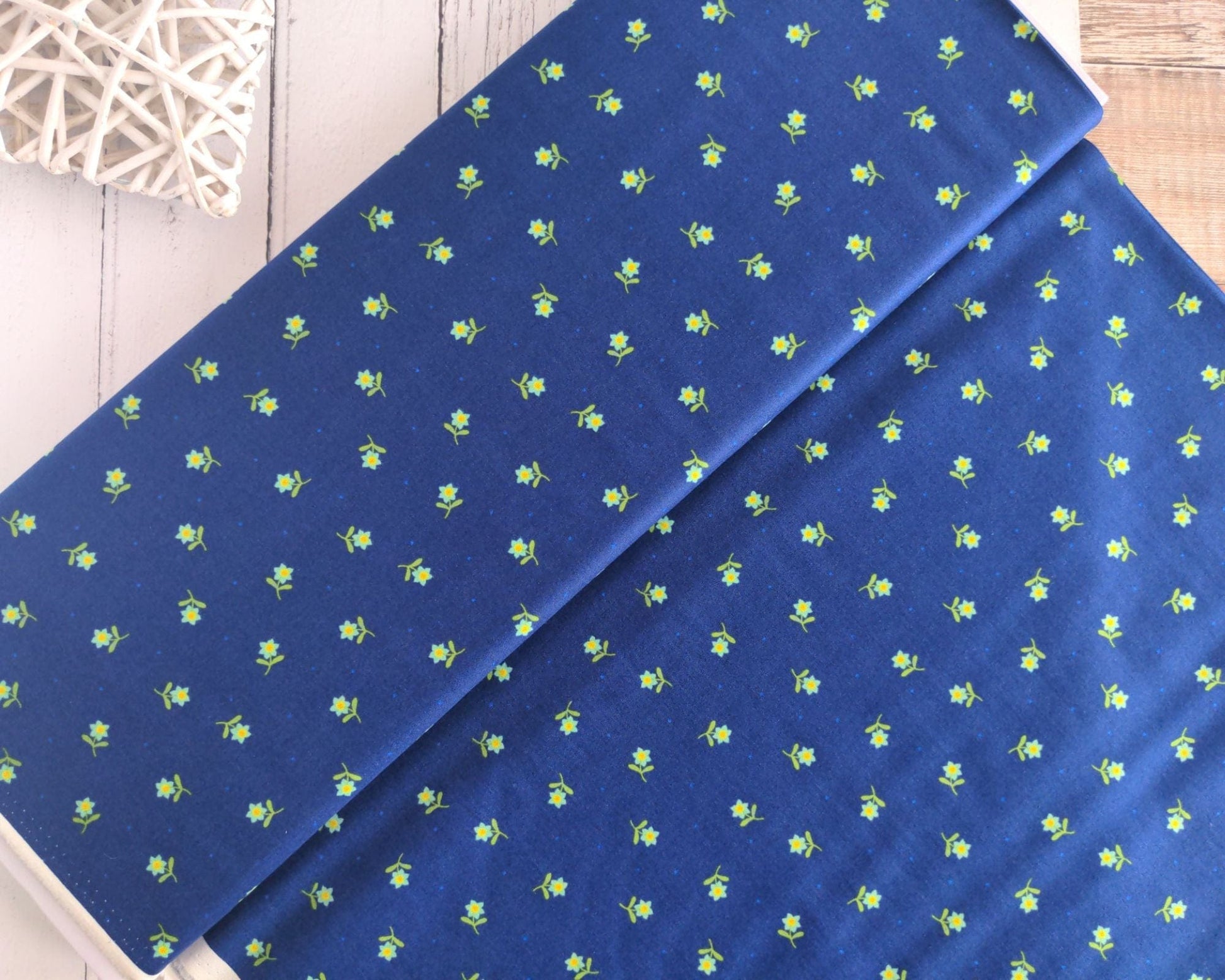 Fabric Daisies on a navy cotton fabric 'Hibiscus Hummingbird'