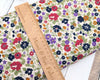 Fabric Ditsy florals on cream cotton lawn - Peter Horton