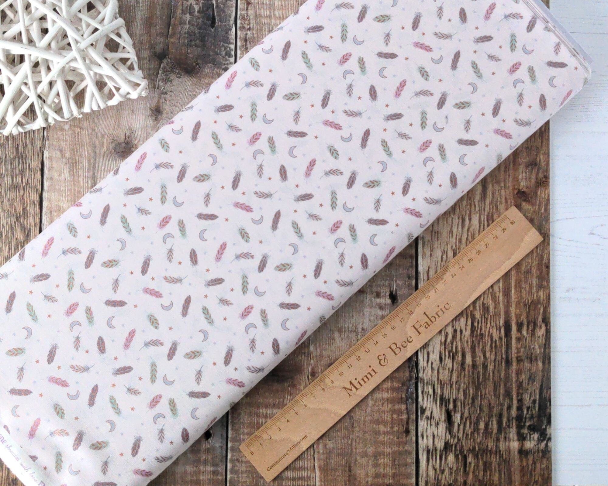 Fabric Feathers and stars on cream cotton fabric - Enchanted by Lewis & Irene