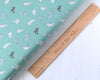 Fabric Grey Seals on green cotton fabric - Polar Animals by Lewis & Irene