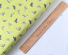 Fabric Grey Seals on lime green cotton fabric - Polar Animals by Lewis & Irene