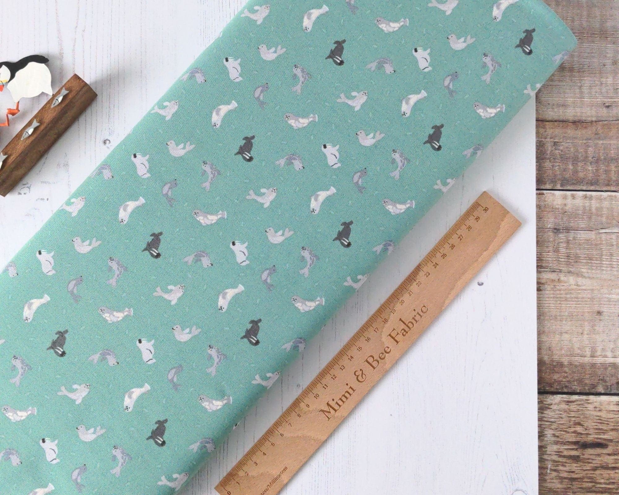 Fabric Grey Seals on lime green cotton fabric - Polar Animals by Lewis & Irene