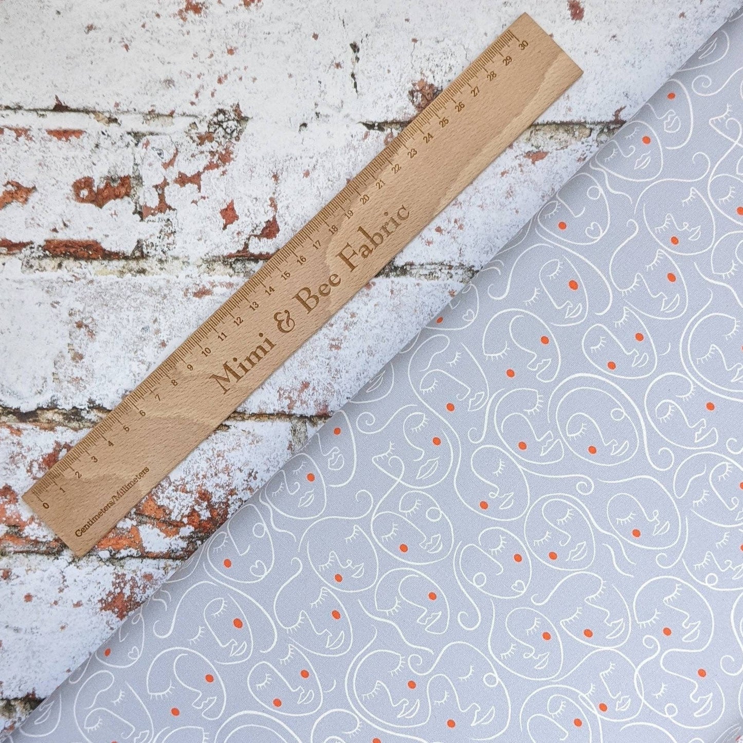 Fabric Half Metre - Grey abstract art faces on cotton fabric - Lewis & Irene