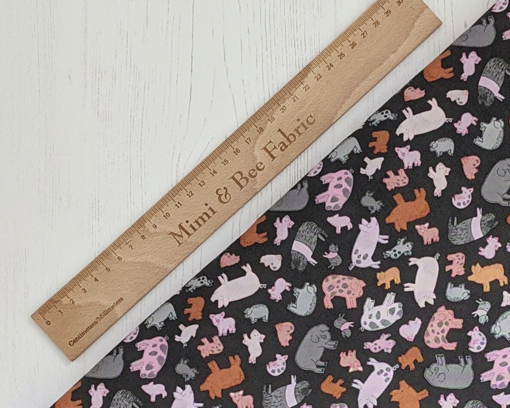 Fabric Half Metre - Pigs on brown cotton fabric by Lewis & Irene - Piggy Tales