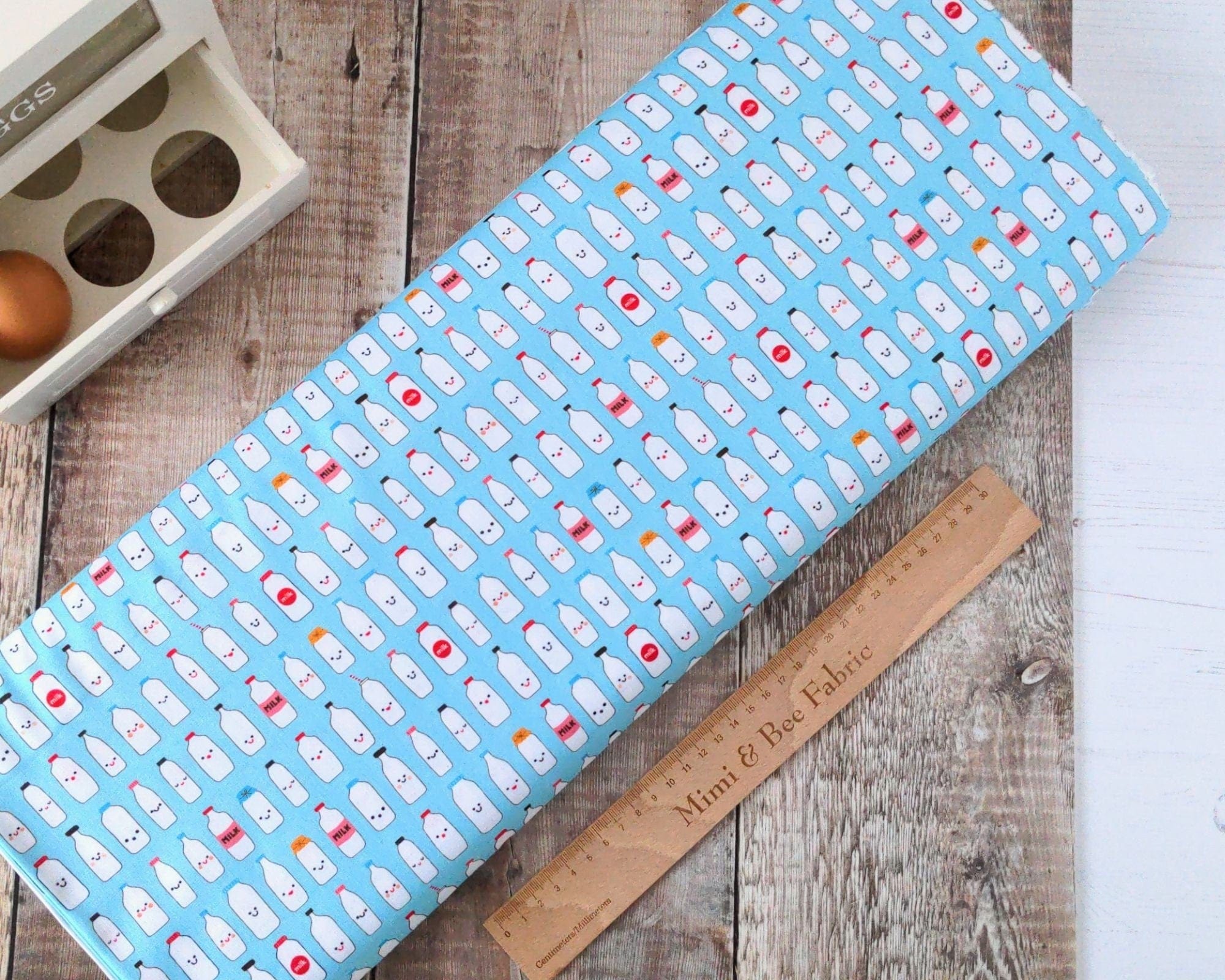 Fabric Happy Milk Bottles on Bright Blue cotton fabric - Farm to Table by Robert Kaufman