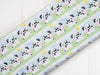 Striped fabric with cows all in a line with sun shining - Playful Farm by Fabric Editions