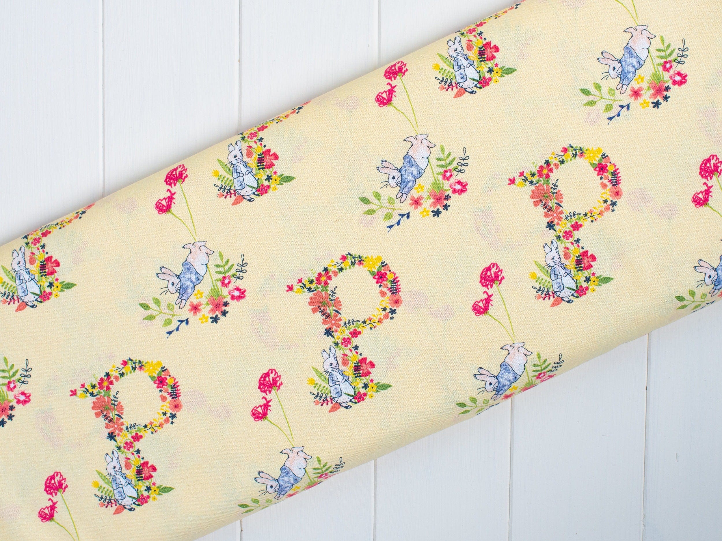 Fabric Peter Rabbit spring nursery fabric on white - 'Flowers and Dreams' CraftCottonCo