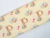 Peter Rabbit on spring nursery yellow cotton fabric - 'Flowers and Dreams' CraftCottonCo