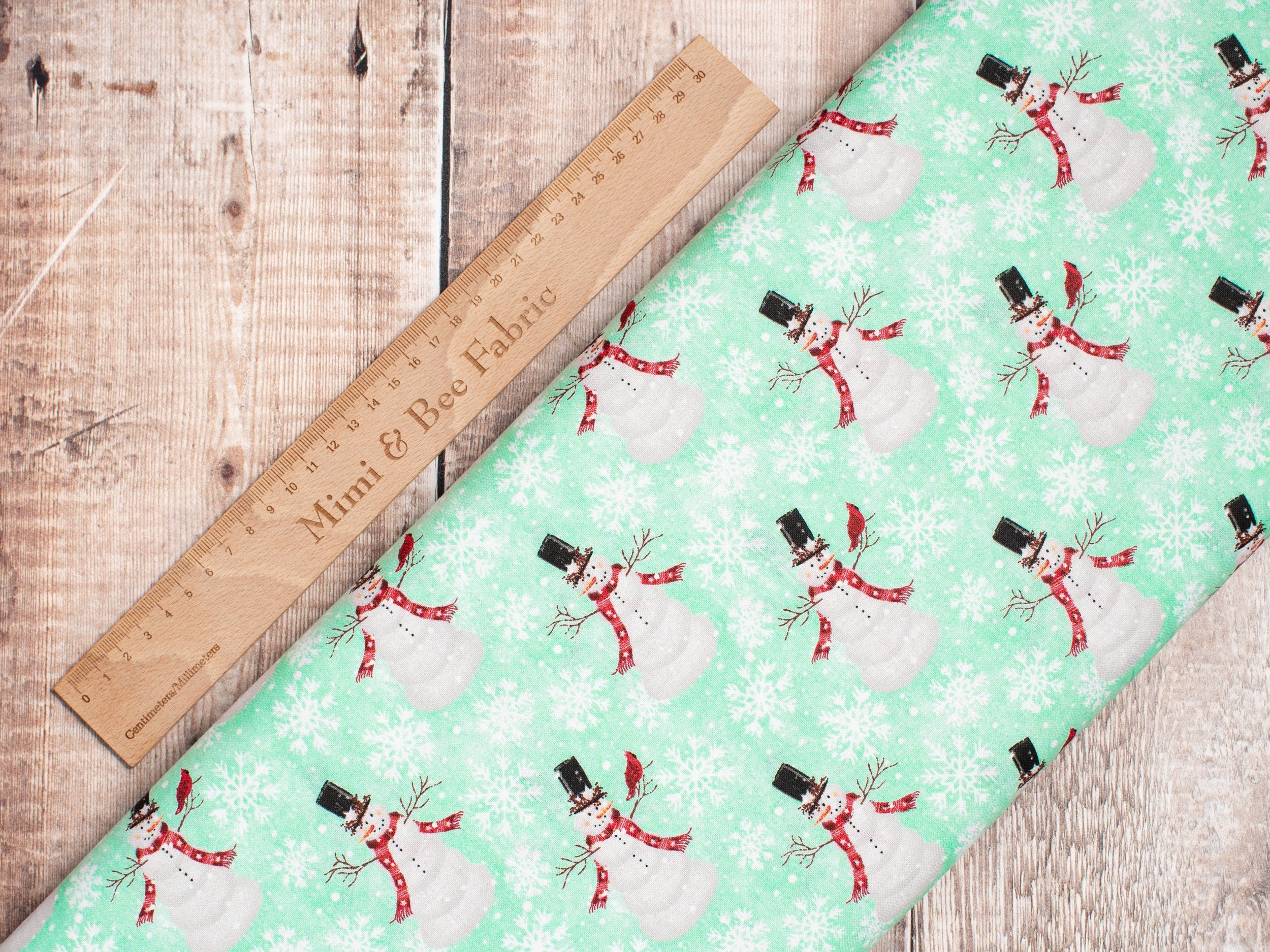Snowmen on mint green cotton fabric - Home for the Holidays - 3 wishes