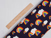 Rainbows and clouds on a navy cotto stretch jersey