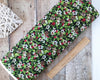 Winter green foliage red berry fabric with pine cones on 100% quilting cotton fabric - Northcott