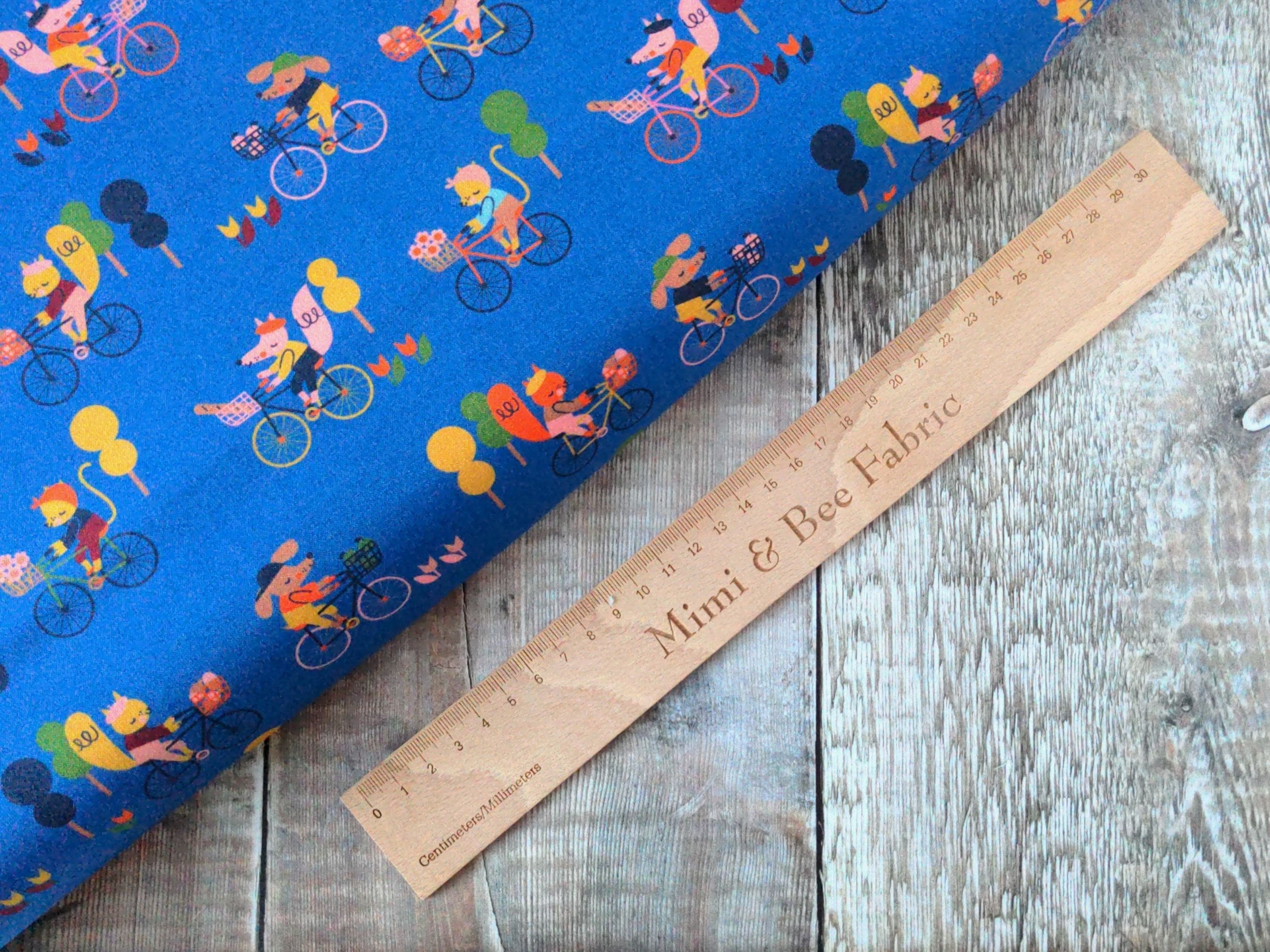 Cats, dogs, foxes, bikes on blue cotton fabric - 'Hello Velo' by Dashwood Studio