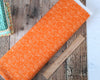 Load image into Gallery viewer, Orange dinosaur fabric - Eat Your Veggies by Riley Blake