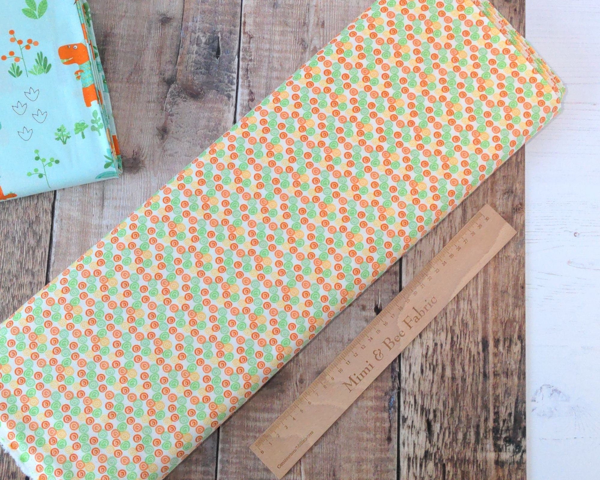 Coloured pebbles on cream cotton fabric - Eat Your Veggies by Riley Blake