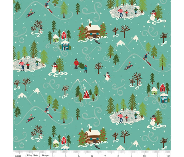 Winter village in the mountains with pretty houses, chalets, ice rinks and pine trees left and right. On green 100% cotton fabric.