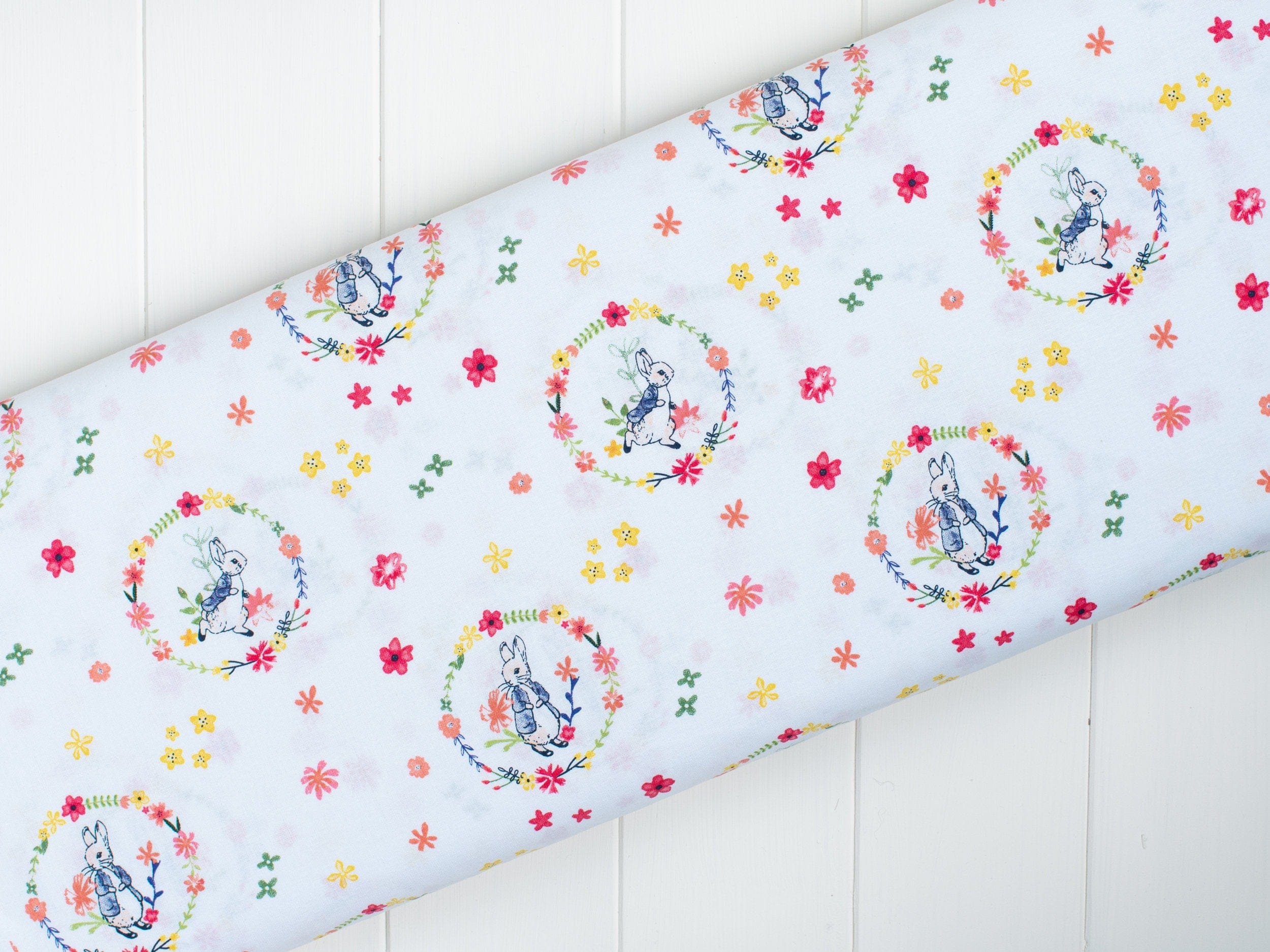 Fabric Peter Rabbit spring nursery fabric on white - 'Flowers and Dreams' CraftCottonCo