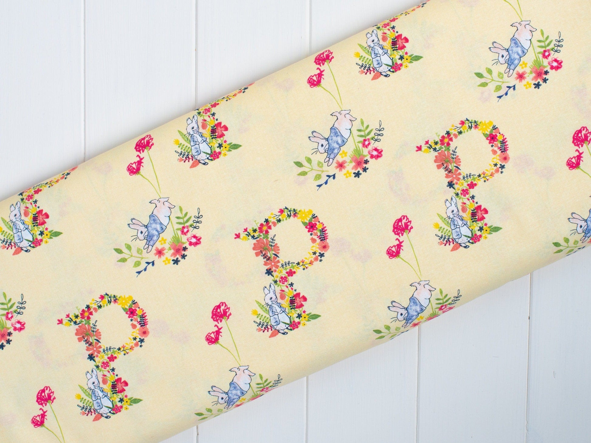 Fabric Peter Rabbit spring nursery fabric on white - 'Flowers and Dreams' CraftCottonCo