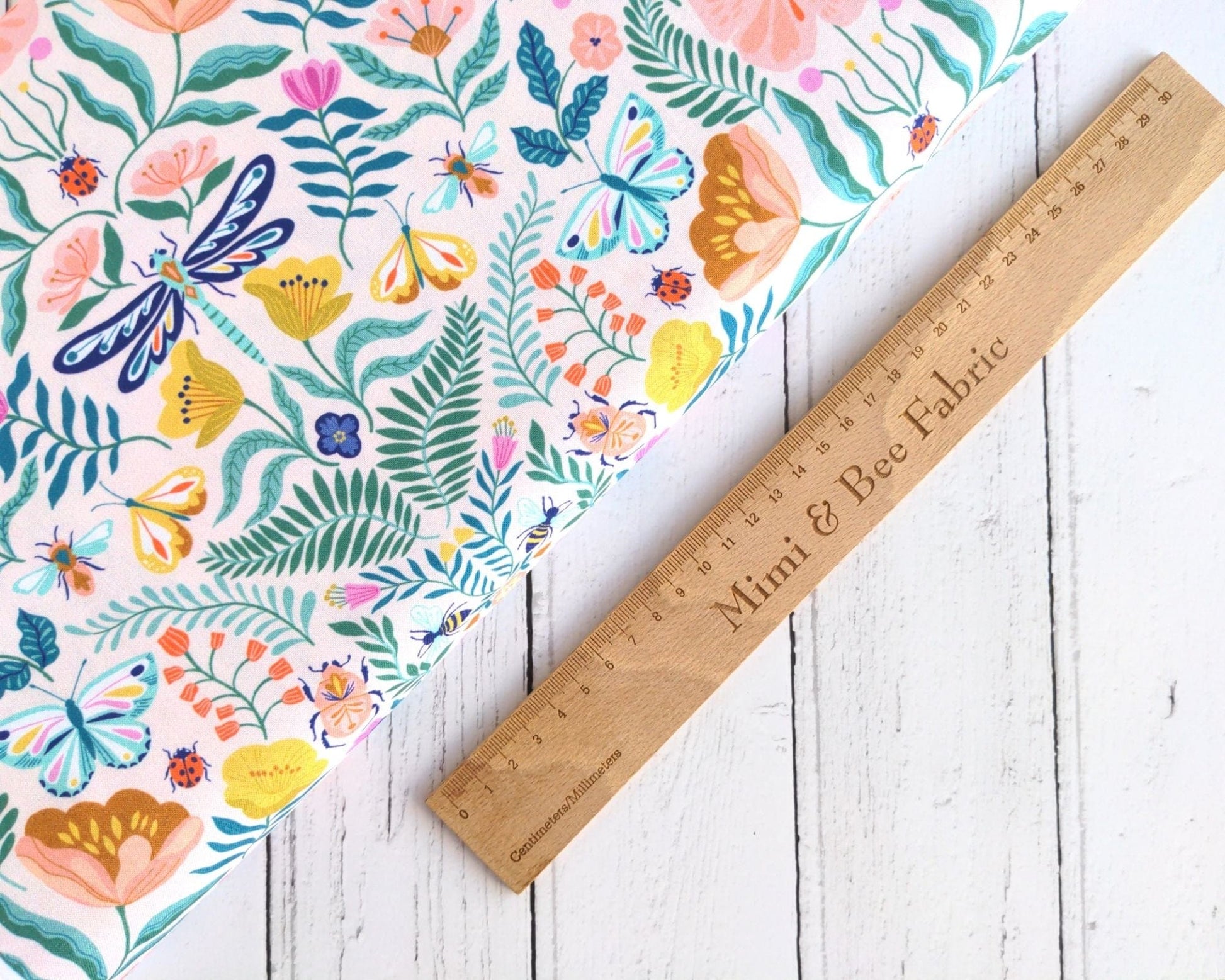 Fabric Pretty Florals, Bugs & Butterflies on Pale Pink cotton fabric - Flutter By by Dashwood Studio