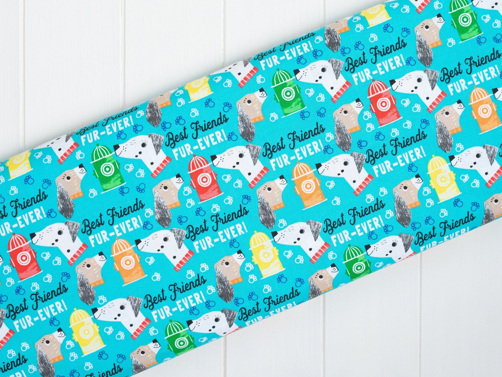 Fabric Puppy Dogs on Light Blue Cotton Fabric - Fabric Editions