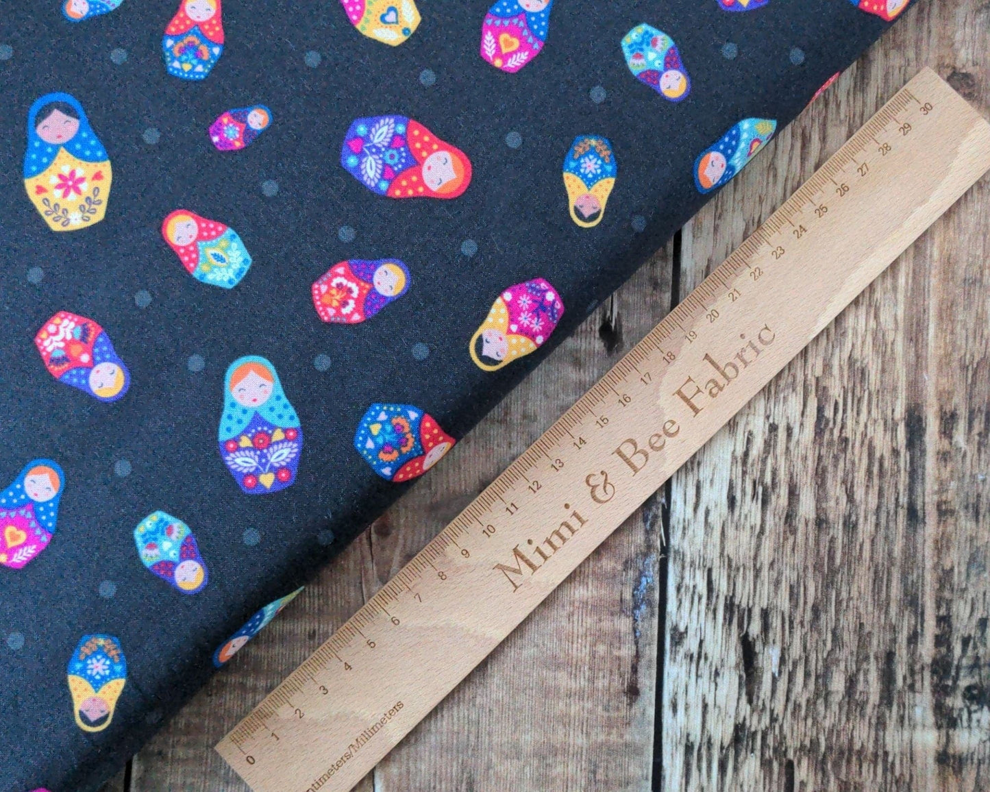 Fabric Russian Dolls on Black 100% cotton fabric - Little Matryoshka by Lewis & Irene