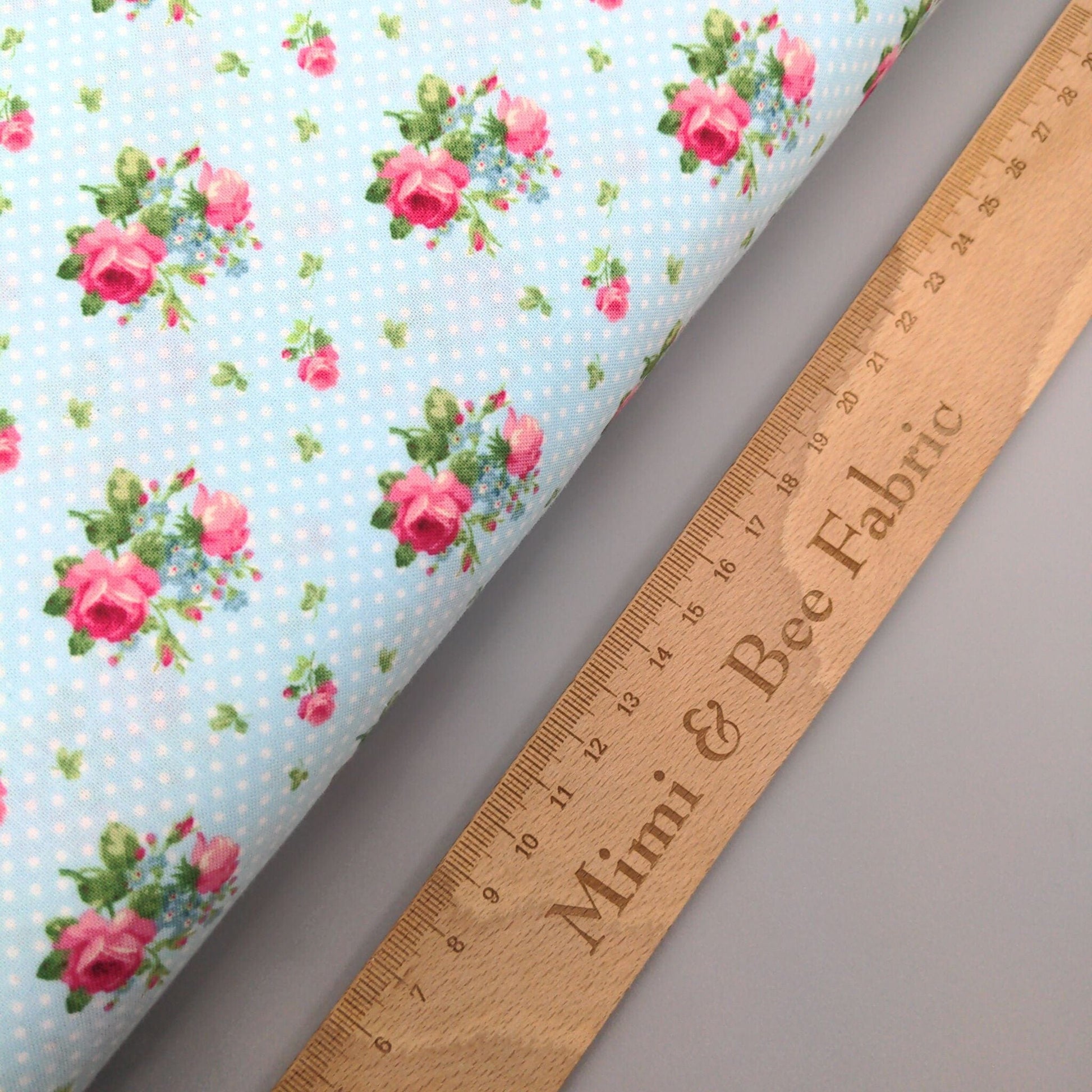 fabric Vintage style pink roses on a pale blue polka dot fabric - Tea for Two - Northcott