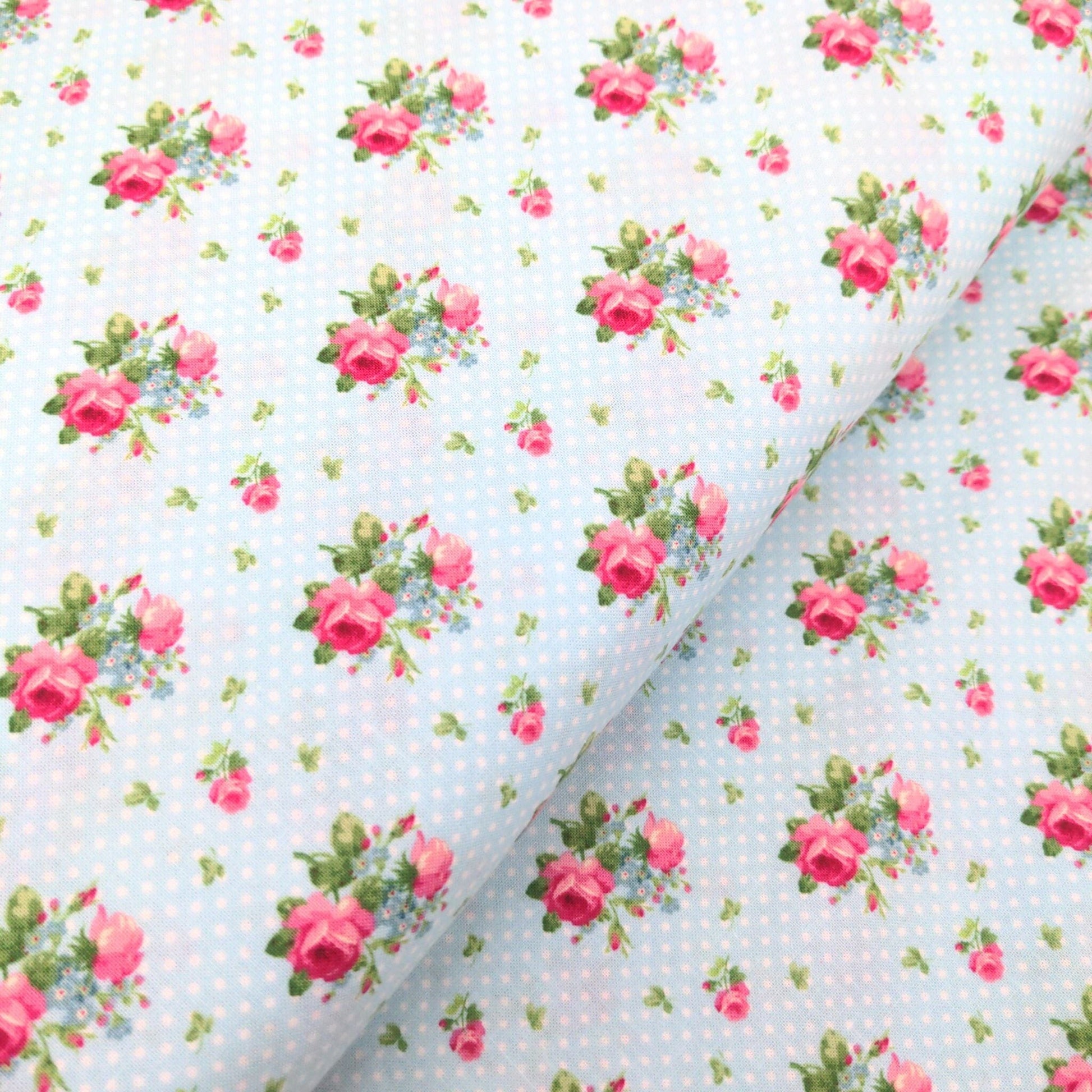 fabric Vintage style pink roses on a pale blue polka dot fabric - Tea for Two - Northcott
